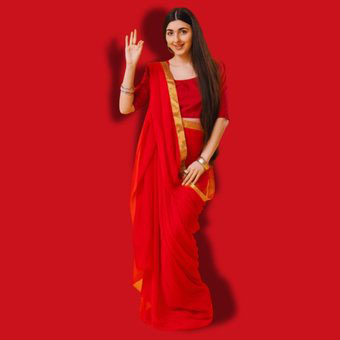 Traditional Indian saree with intricate design worn by a woman for festive or wedding occasion